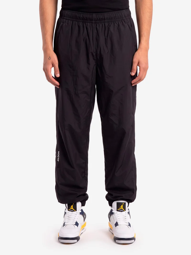 x Drake track pants woven NOCTA
