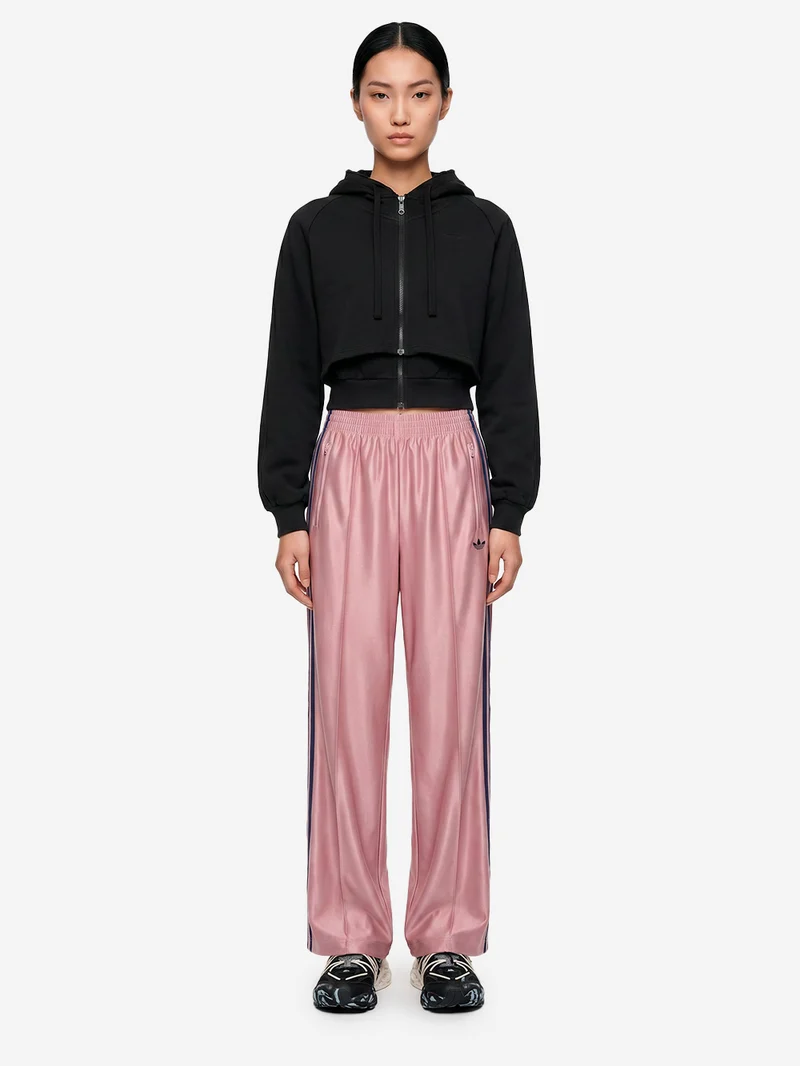 Pantaloni loose 'Firebird' rosa con stripes nere