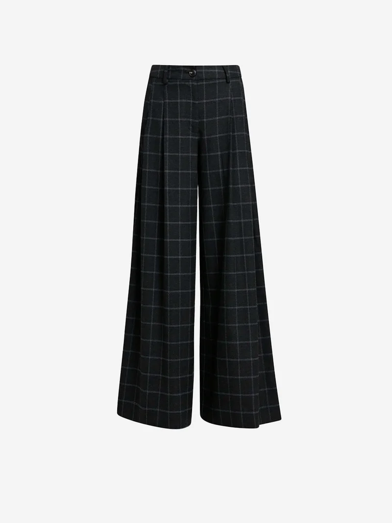 Pantaloni a quadri con cucitura ritorta