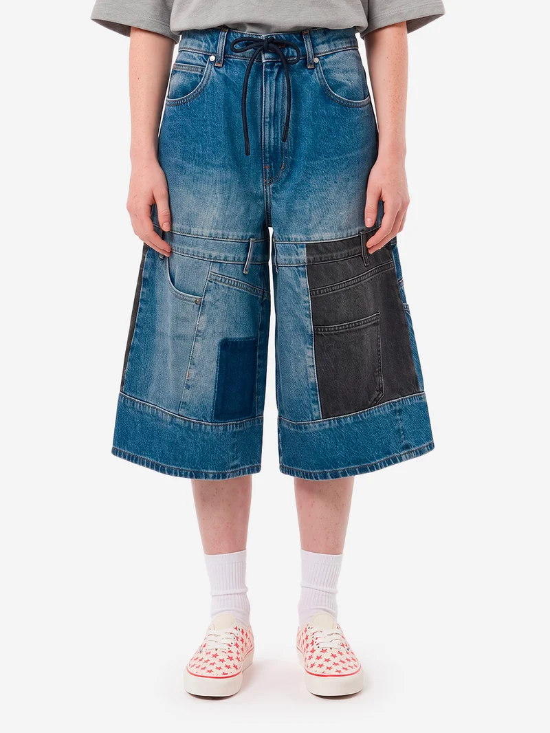Bermuda denim con patchwork a doppio pannello blu e nero