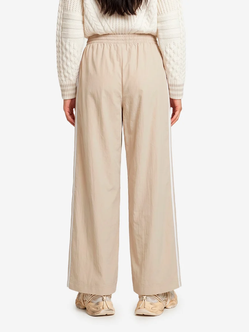 Pantaloni track beige Firebird con stripes bianche