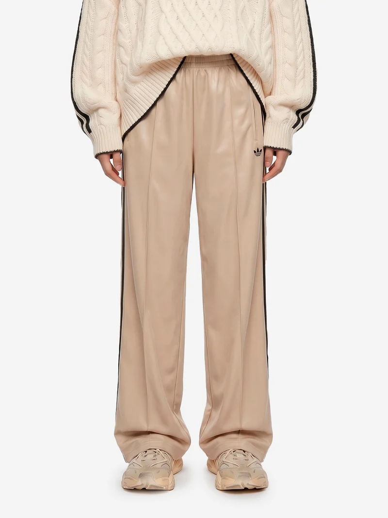 Pantaloni loose 'Firebird' beige con stripes nere
