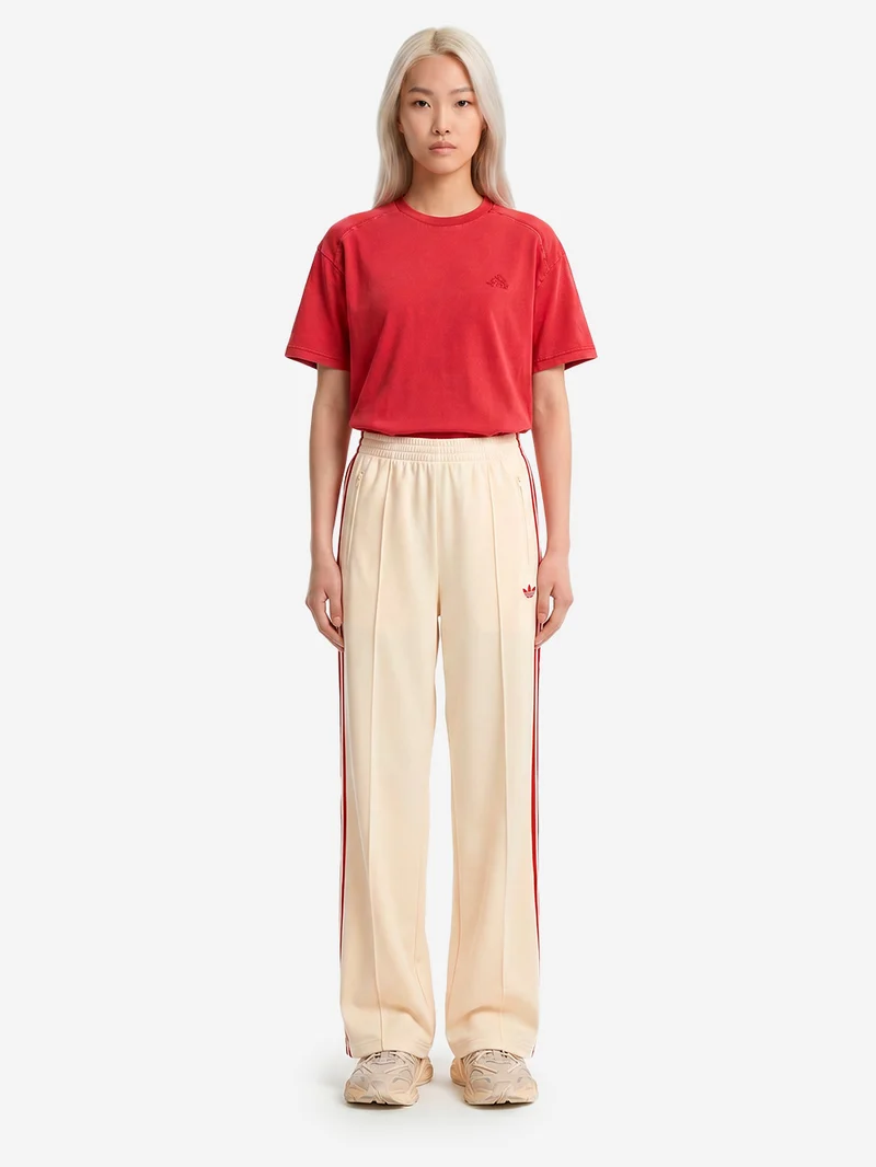 Pantaloni loose Firebird vaniglia con stripes rosse