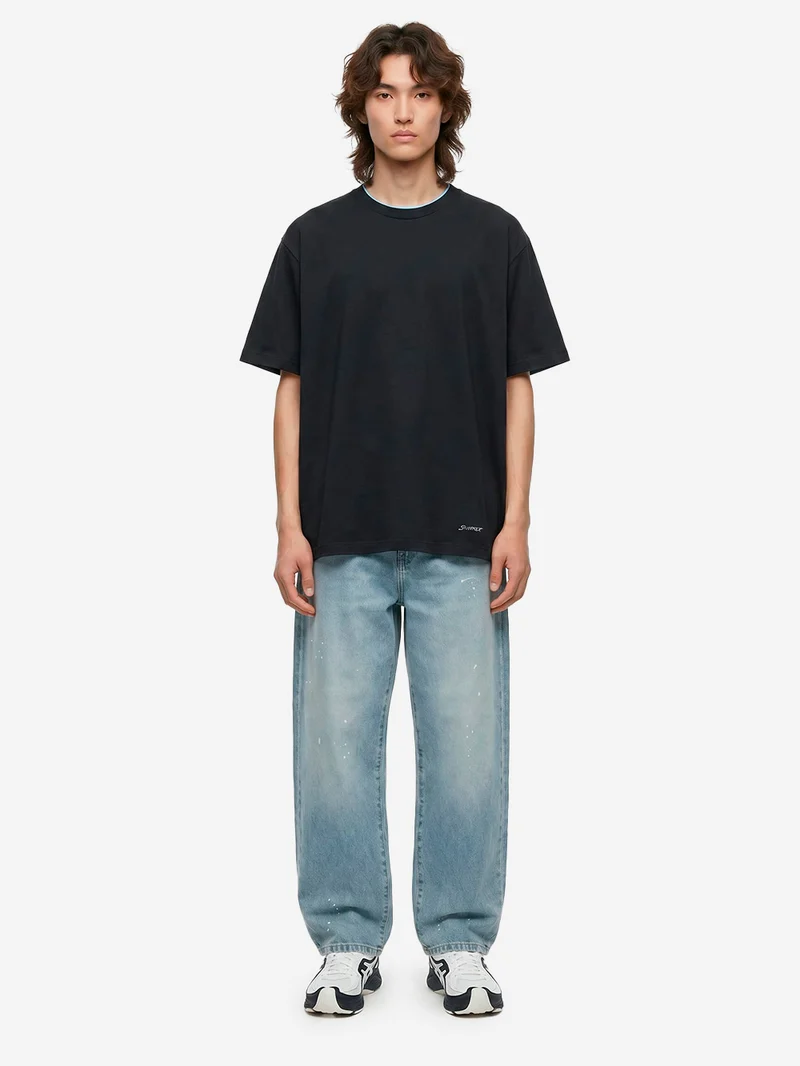 T-shirt nera in cotone Luster con colletto a costine e finiture cut-off