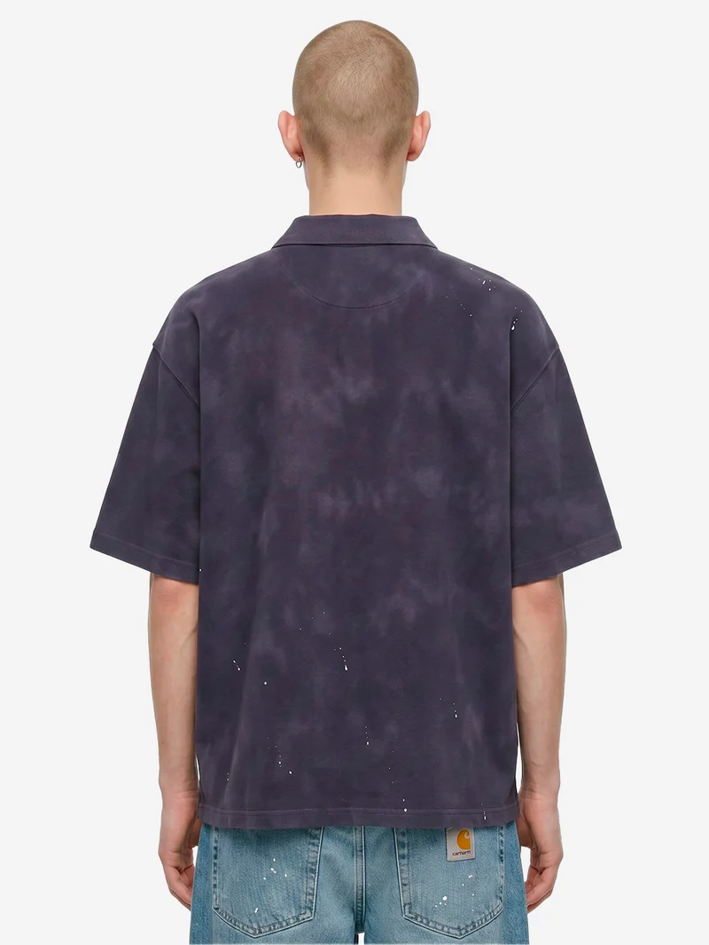 Polo Painter blu con trattamento distressed e vernice