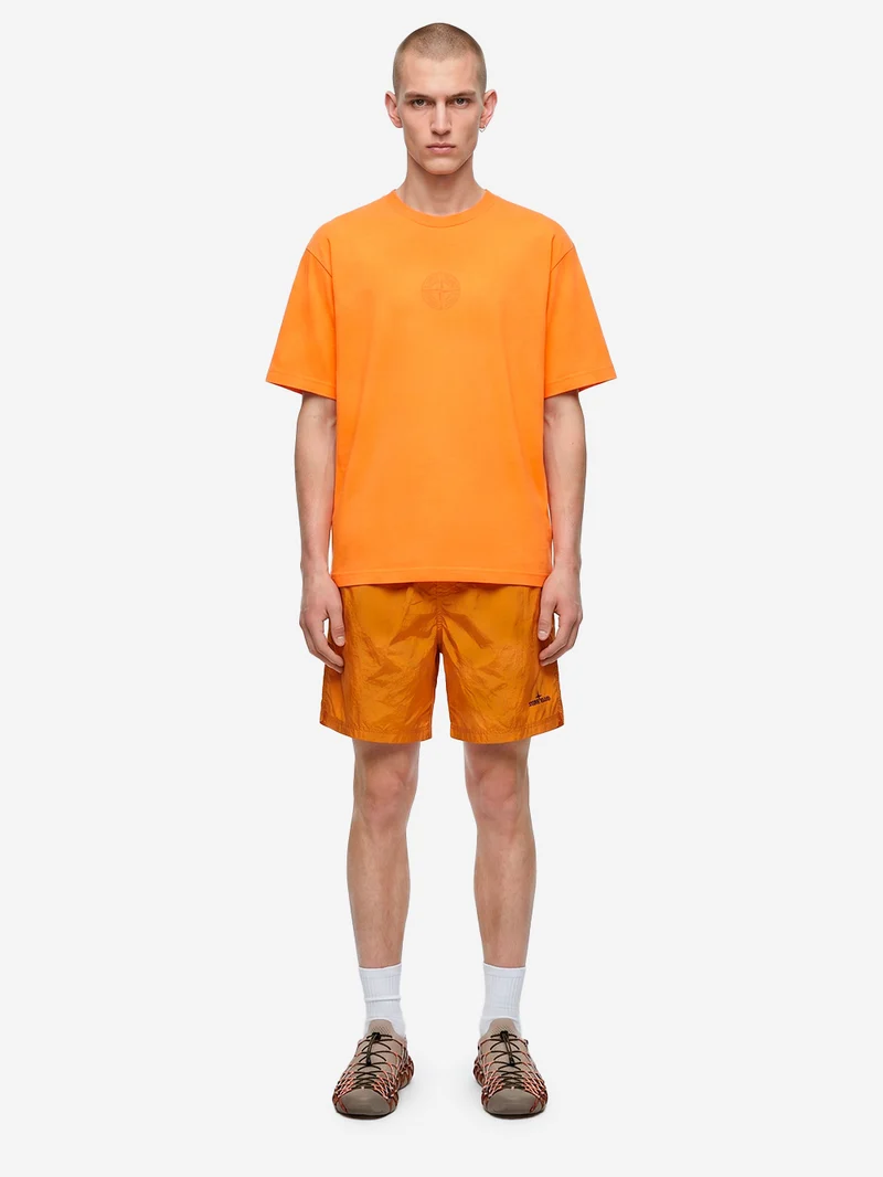 Pantaloncini da bagno arancioni in nylon effetto camouflage sbiadito idroreattivo