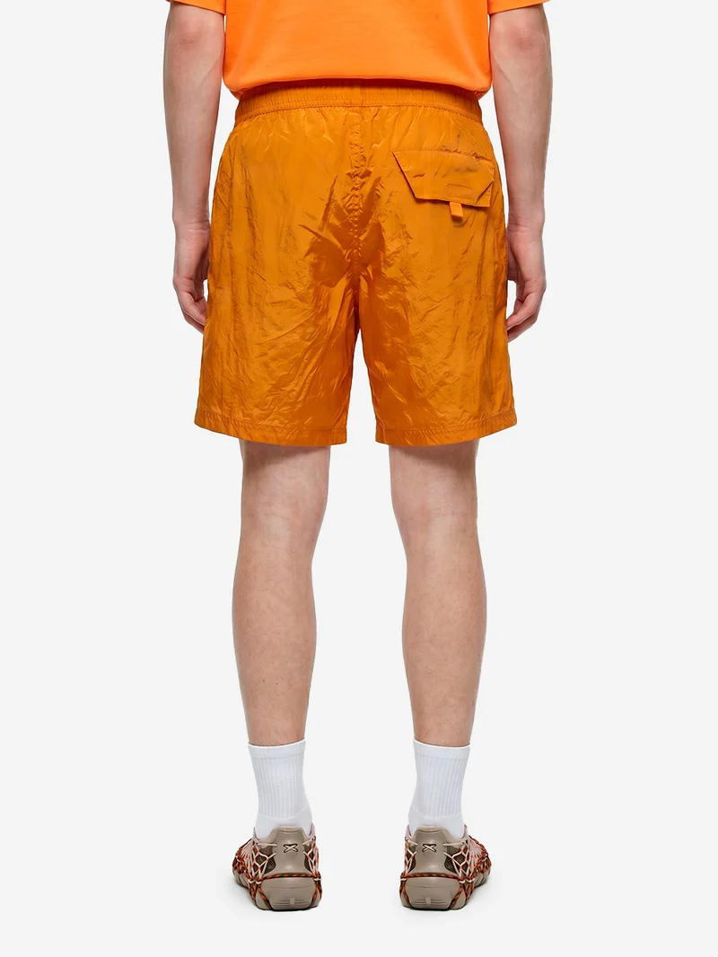 Pantaloncini da bagno arancioni in nylon effetto camouflage sbiadito idroreattivo