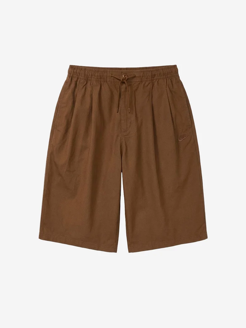 Shorts oversize marroni pleated con Swoosh