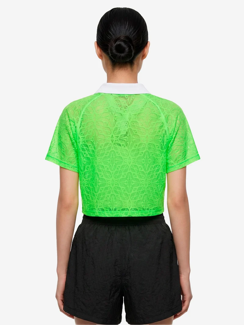 Polo verde fluo in jersey loose fit con pizzo