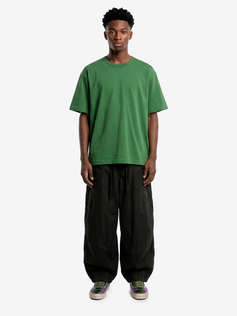 T-shirt in jersey di cotone verde con logo CDG sul retro