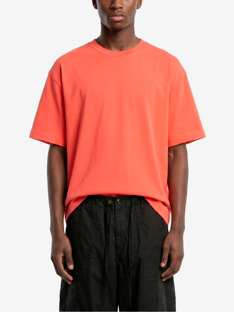 T-shirt in jersey di cotone rosso con logo CDG sul retro