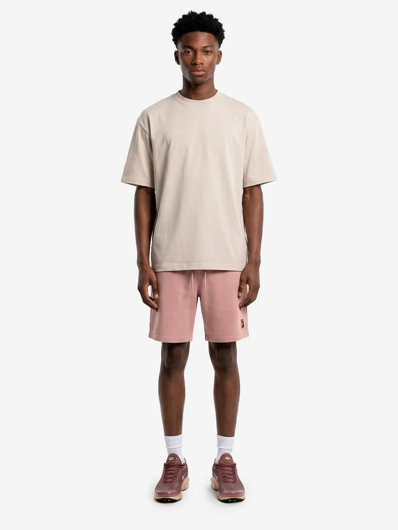 Shorts rosa da tennis in fleece Dri-FIT