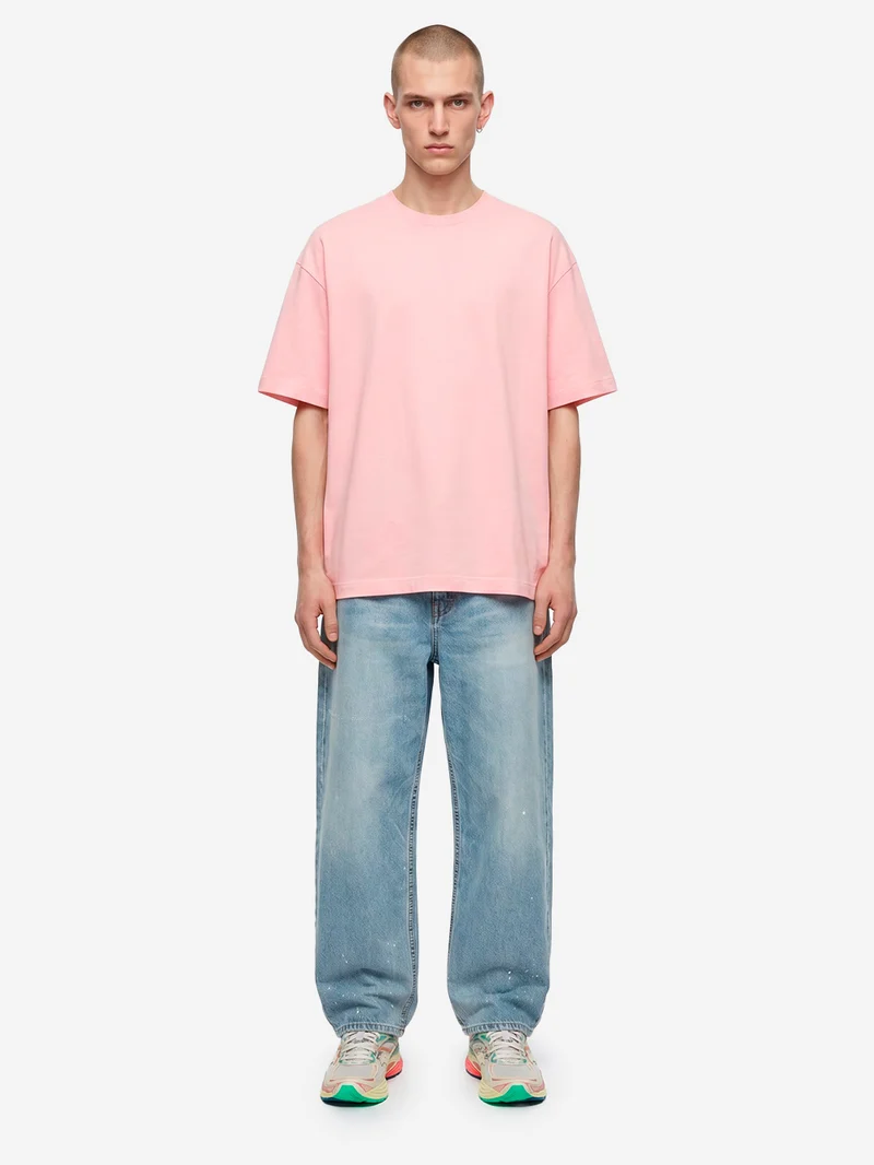 T-shirt in jersey di cotone rosa con logo CDG sul retro