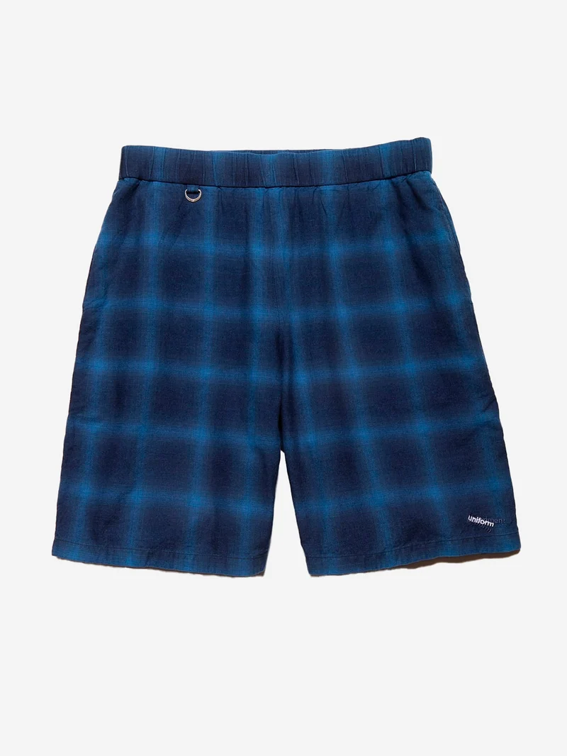 Shorts a quadri indigo