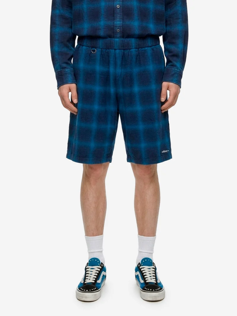 Shorts a quadri indigo