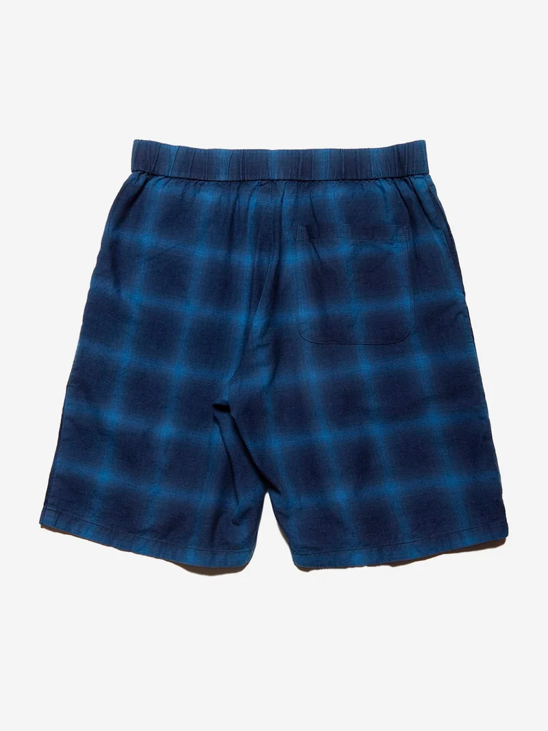 Shorts a quadri indigo
