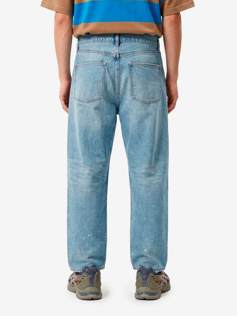 Jeans distressed cimosati in blu indigo chiaro