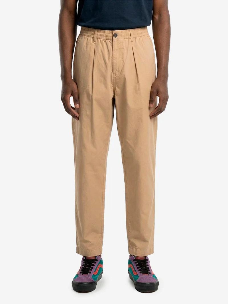 Pantaloni beige con piega frontale e coulisse