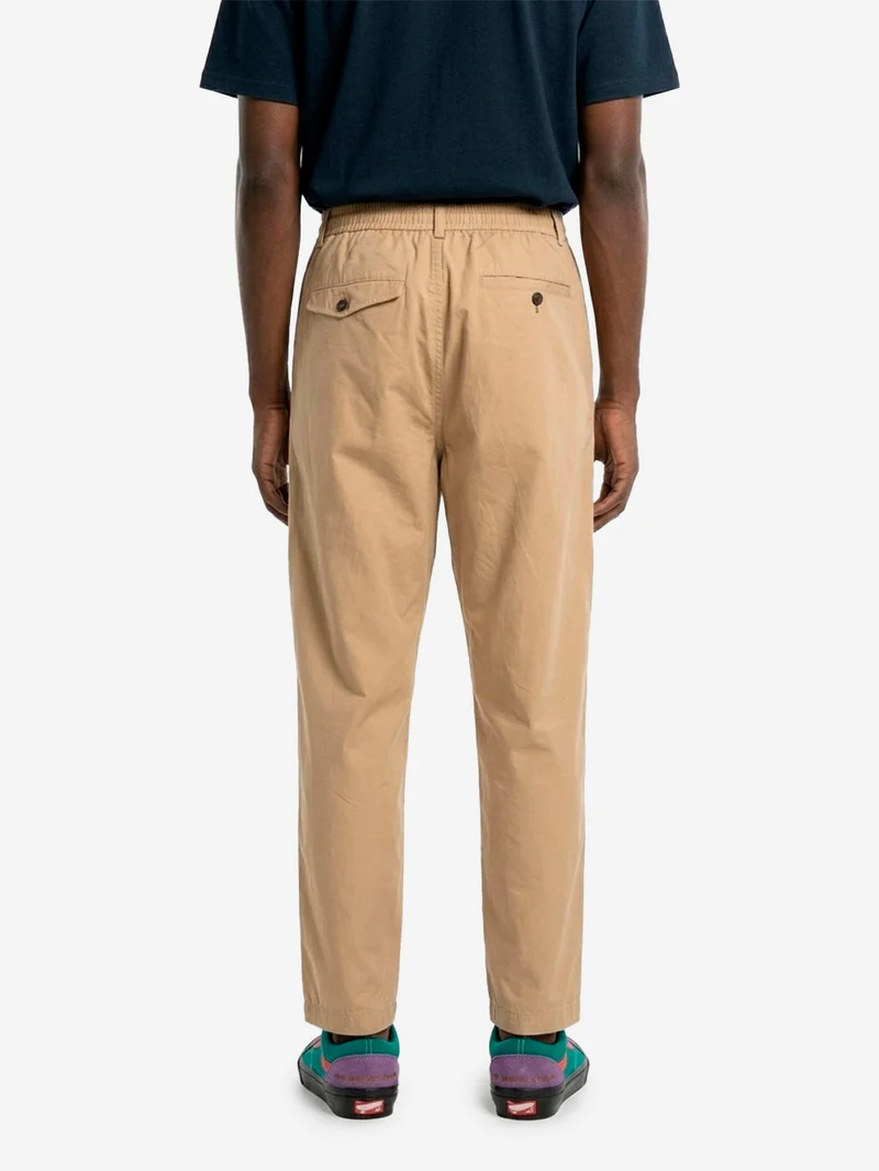 Pantaloni beige con piega frontale e coulisse