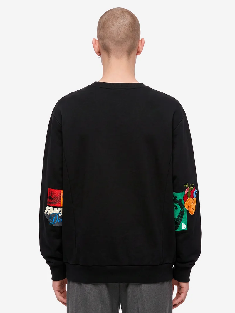 Felpa nera ricamata con dettaglio zip