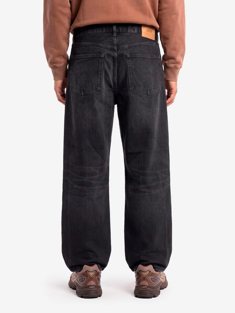 Jeans neri wide con over dye rosa