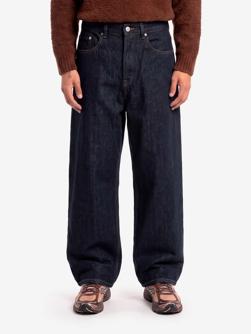 Pantaloni blu wide in denim cimosato