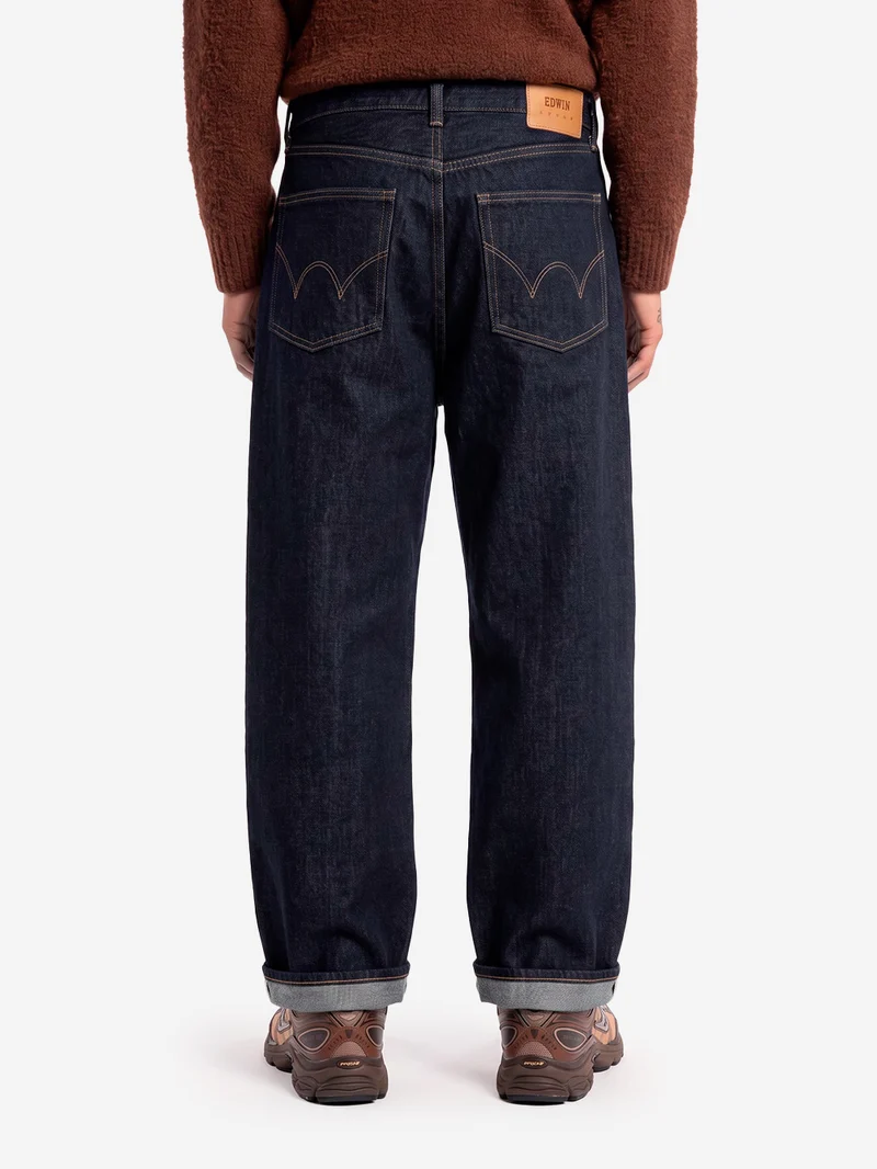 Pantaloni blu wide in denim cimosato
