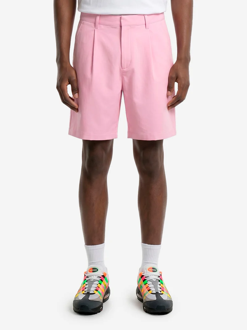 Shorts da golf in tessuto elasticizzato rosa Dri-FIT