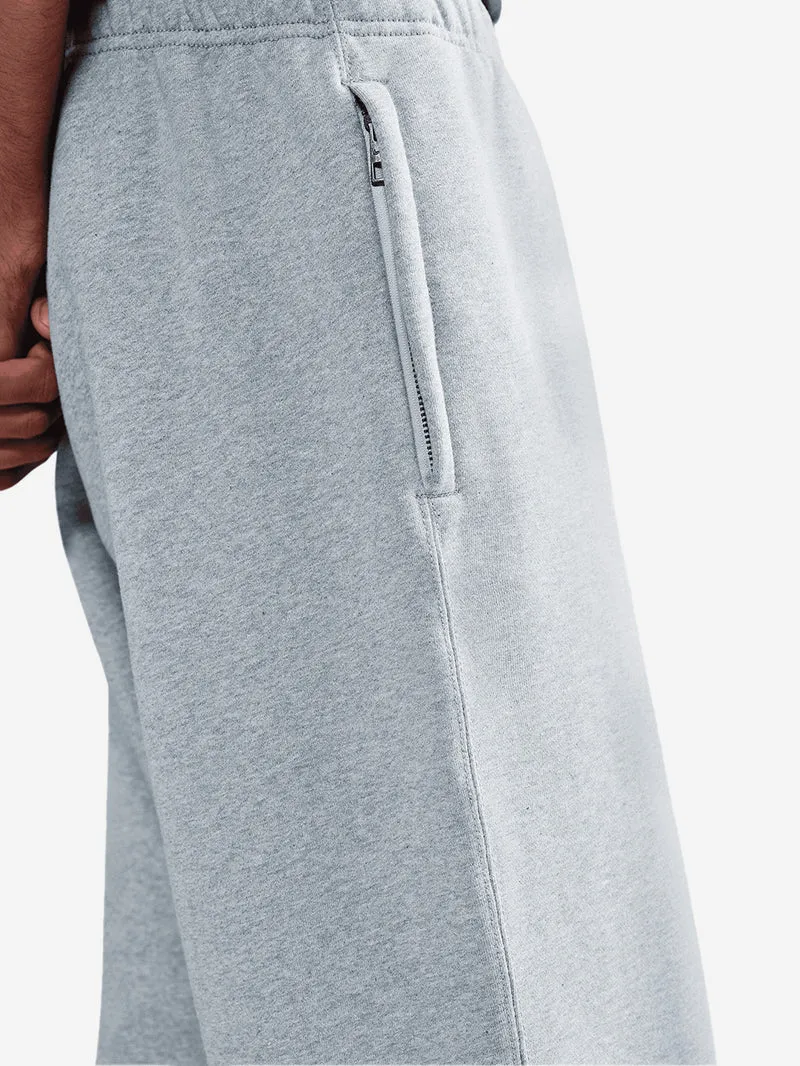 Pantaloni grigi in fleece con orlo aperto