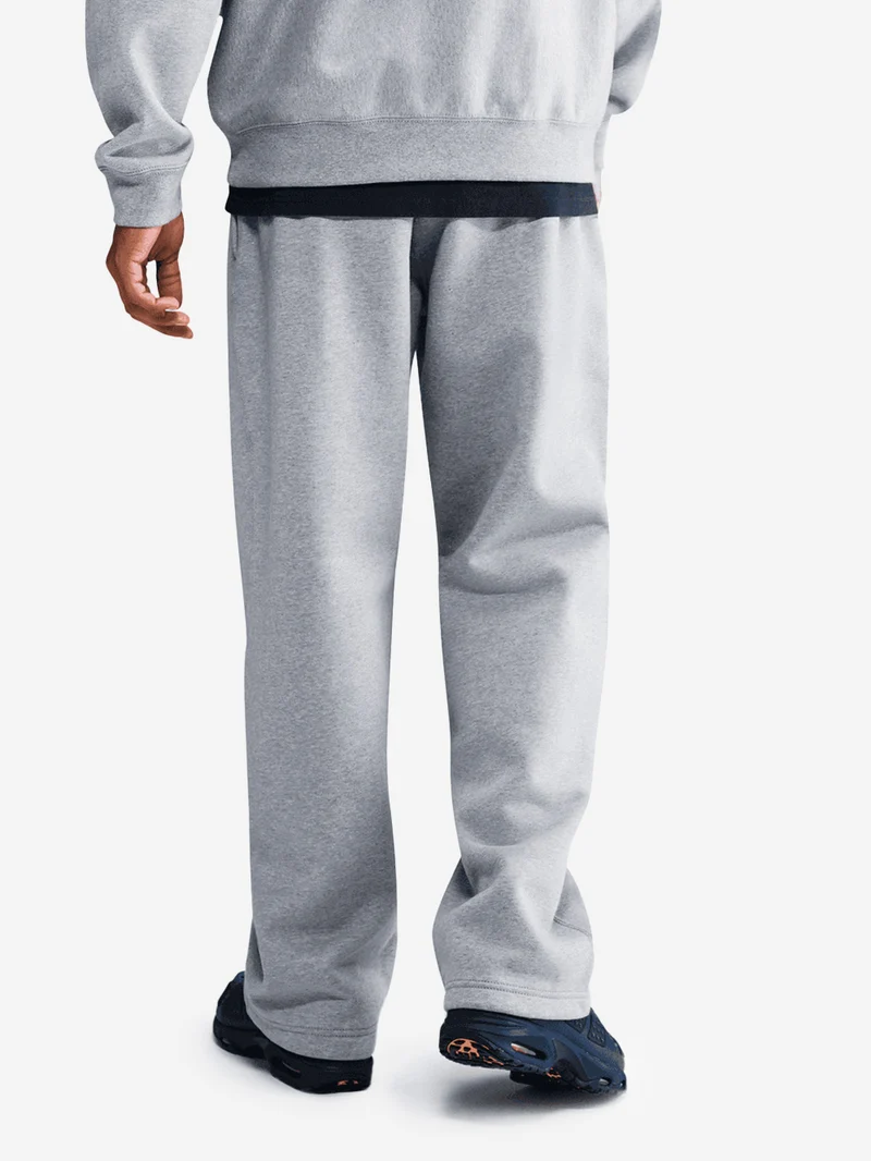 Pantaloni grigi in fleece con orlo aperto