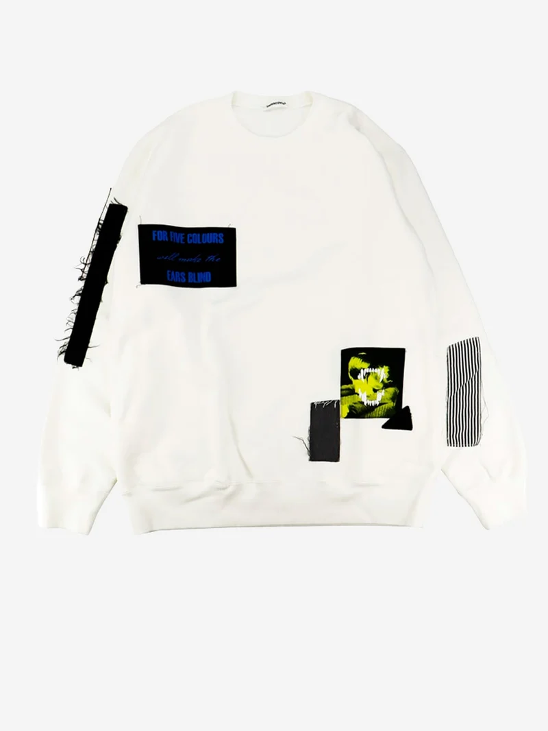 Pullover bianco con grafica e patchwork