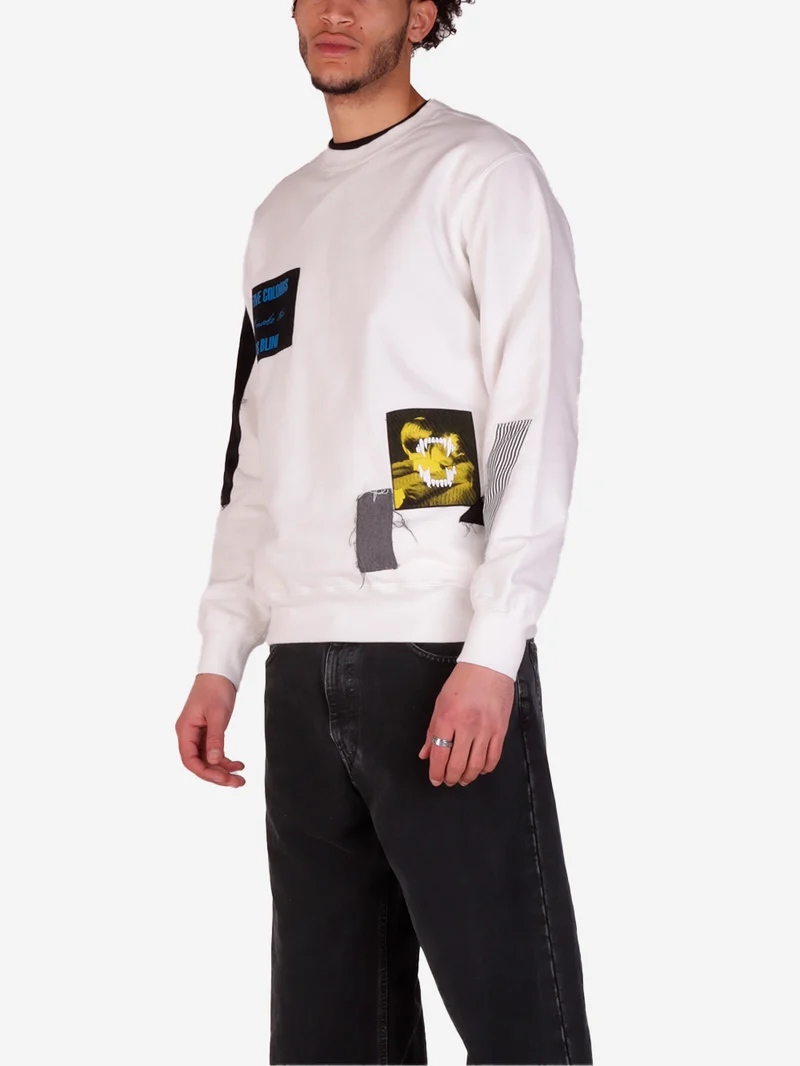 Pullover bianco con grafica e patchwork