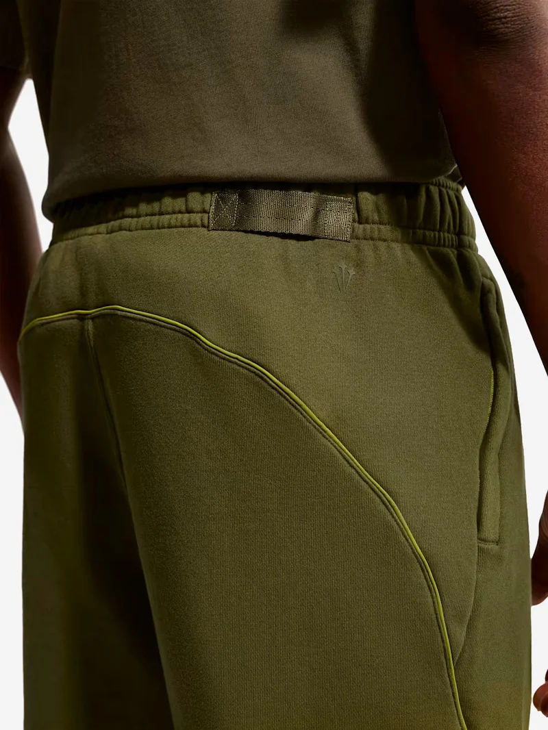 Pantaloni fleece verdi CS Nocta x Drake con elastico alla caviglia