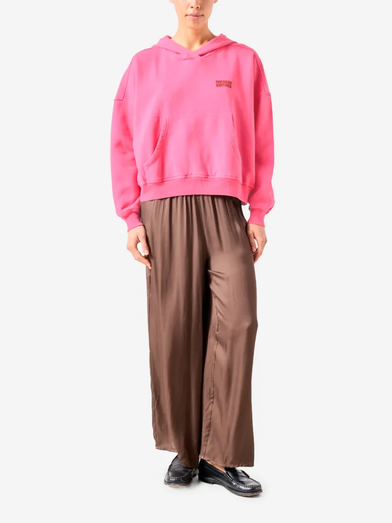 Felpa con cappuccio rosa ed effetto vintage