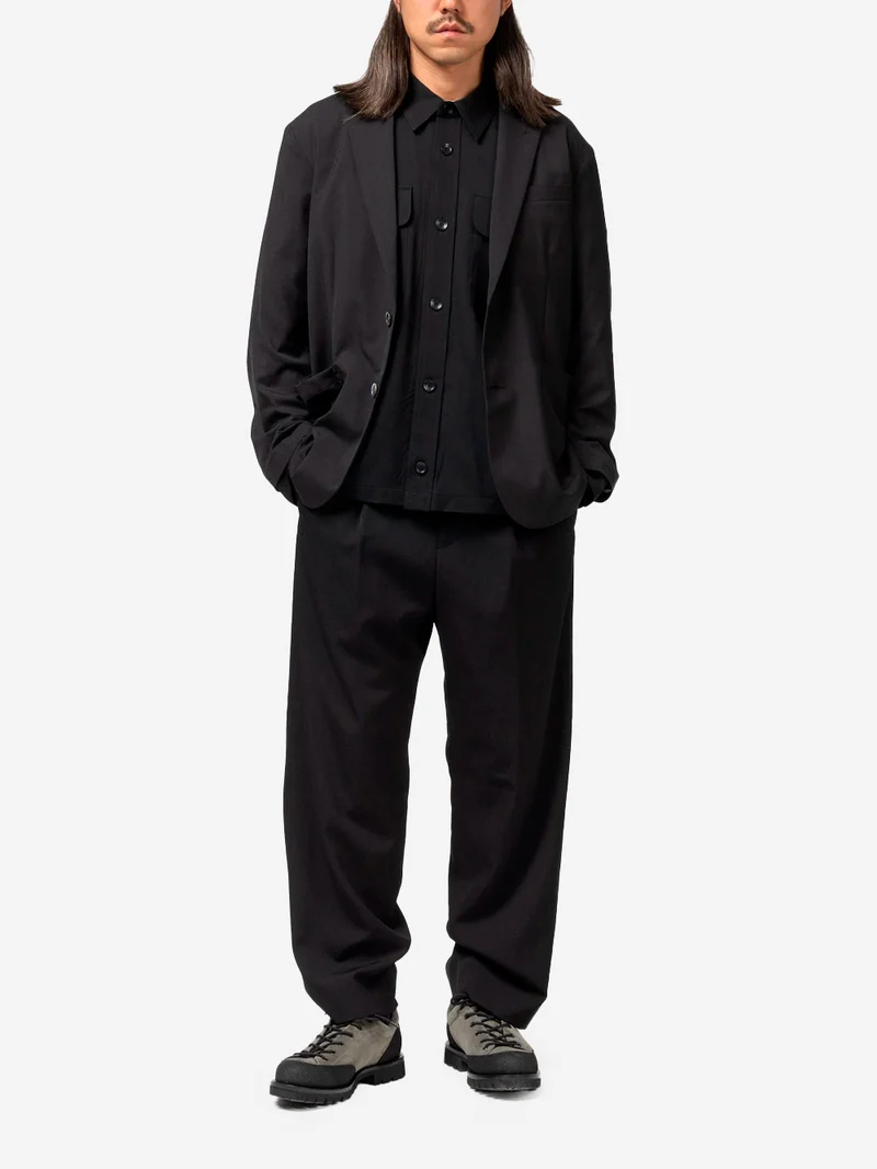 Pantaloni di lana sartoriali relaxed fit con piega