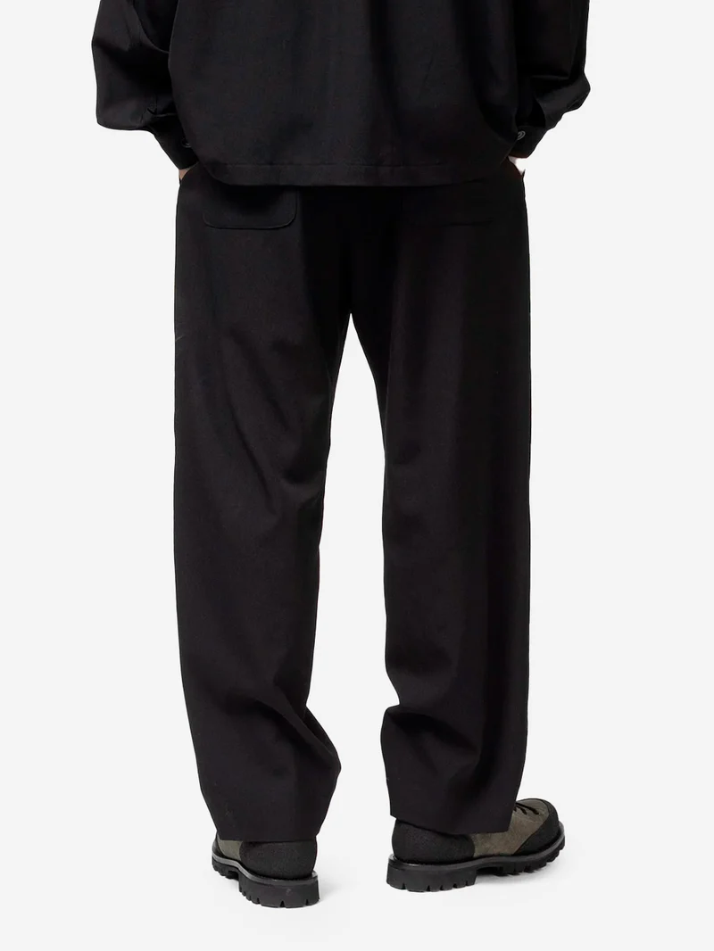 Pantaloni di lana sartoriali relaxed fit con piega