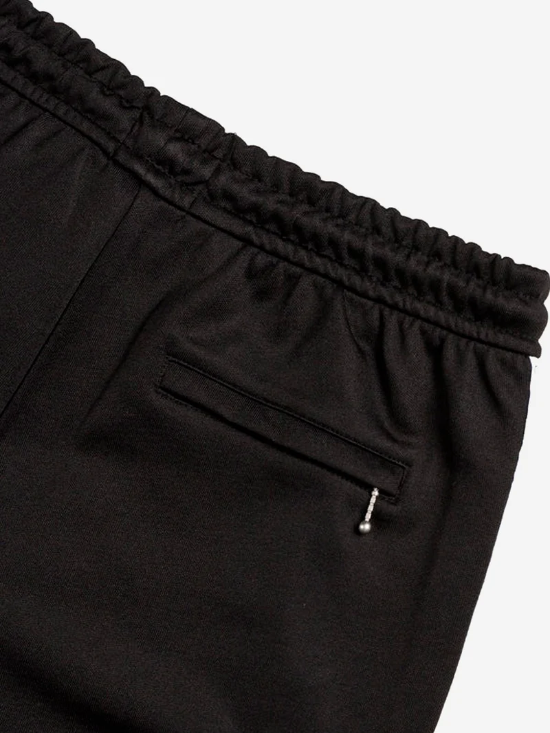 Pantaloni track in jersey tecnico con logo