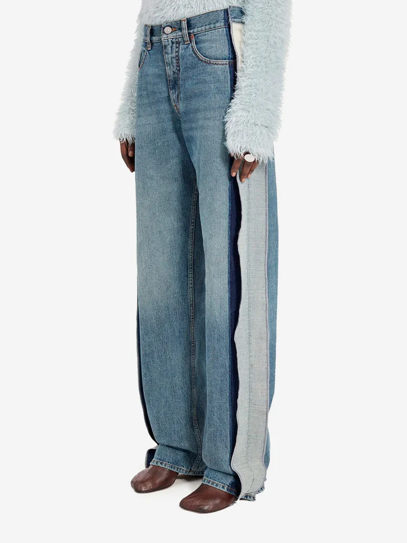Jeans a gamba dritta decostruiti con pannelli e logo Numeric